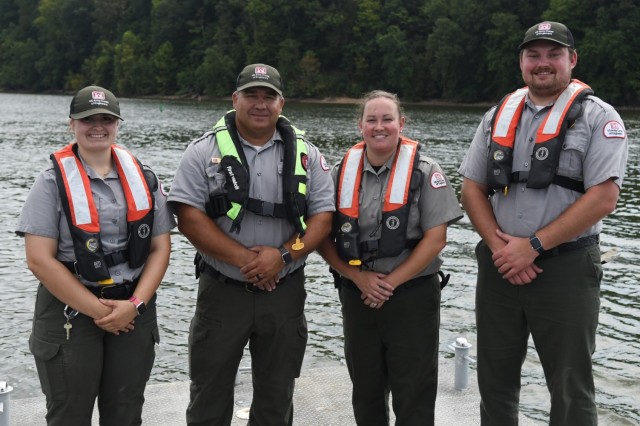 USACE Rangers place buoys on Lake Barkley to warn boaters of shallow water