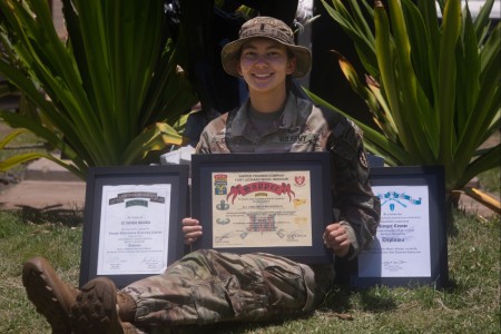 1st Lt. Mackenzie Corcoran, assigned to the 29th Brigade Engineer Battalion, 25th Infantry Division, poses with her Jungle, Sapper and Ranger certificates at Schofield Barracks, Hawaii, June 6, 2024. Corcoran earned the Ranger, Sapper, and Jungle...