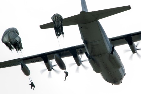 Paratroopers of the 2nd Infantry Brigade Combat Team (Airborne), 11th Airborne Division, the “Arctic Angels”, descend on Malemute Drop Zone at Joint Base Elmendorf-Richardson, Alaska, Aug. 16, 2024, in a mass parachute exhibition for service...