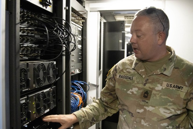 Master Sgt. Clinton Ragsdale inspects radio equipment in the Mobile Command Unit. Soldiers from the Kentucky Army National Guard’s Communication/Information Technology Mission Command mobilized through parts of western Kentucky Aug. 12-16, 2024,...