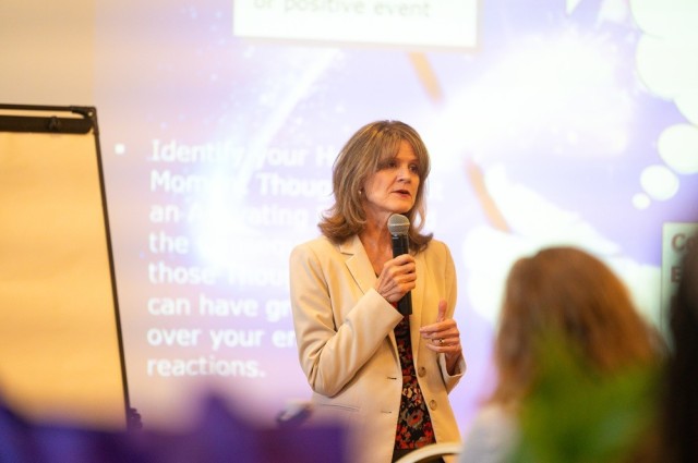 Valerie Francis, the health promotion program manager at Army Materiel Command, speaks during the Garrison’s Wellness Summit Aug. 20.