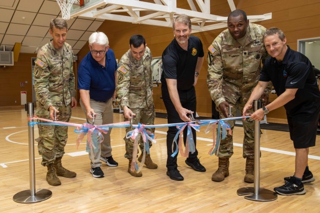 Col. Marcus Hunter, left, commander of U.S. Army Garrison Japan, and others participate in a ribbon-cutting ceremony to officially reopen a fitness center at Sagami General Depot, Japan, Aug. 27, 2024. The center underwent several renovations as...