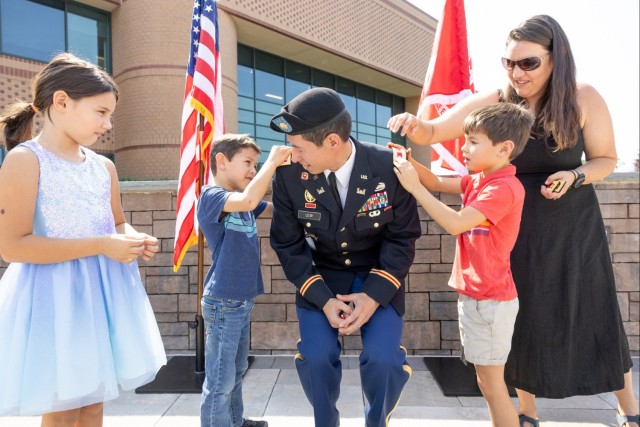 LTC. Donald K. Lew&#39;s family pins on his new rank.