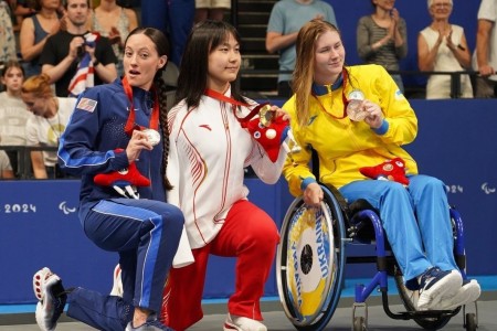 Sgt. 1st Class Elizabeth Marks, left, poses for a photo at the Paris 2024 Paralympic Summer Games. Marks earned Team USA their first medal of the games with a silver medal performance in the women&#39;s 50-meter freestyle S6. Marks earned her 6th...