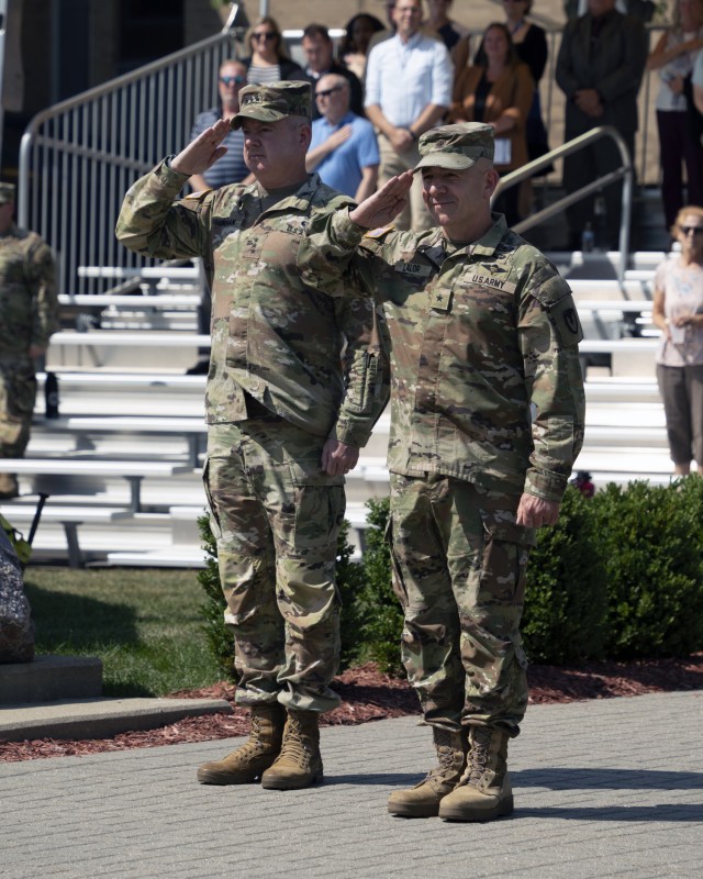 Lt. Gen. Chris Mohan, Army Materiel Command deputy commanding general and acting commander, and TACOM Commanding General Brig. Gen. Michael B. Lalor salute during Lalor’s Aug. 27, 2024 promotion ceremony at the Detroit Arsenal.