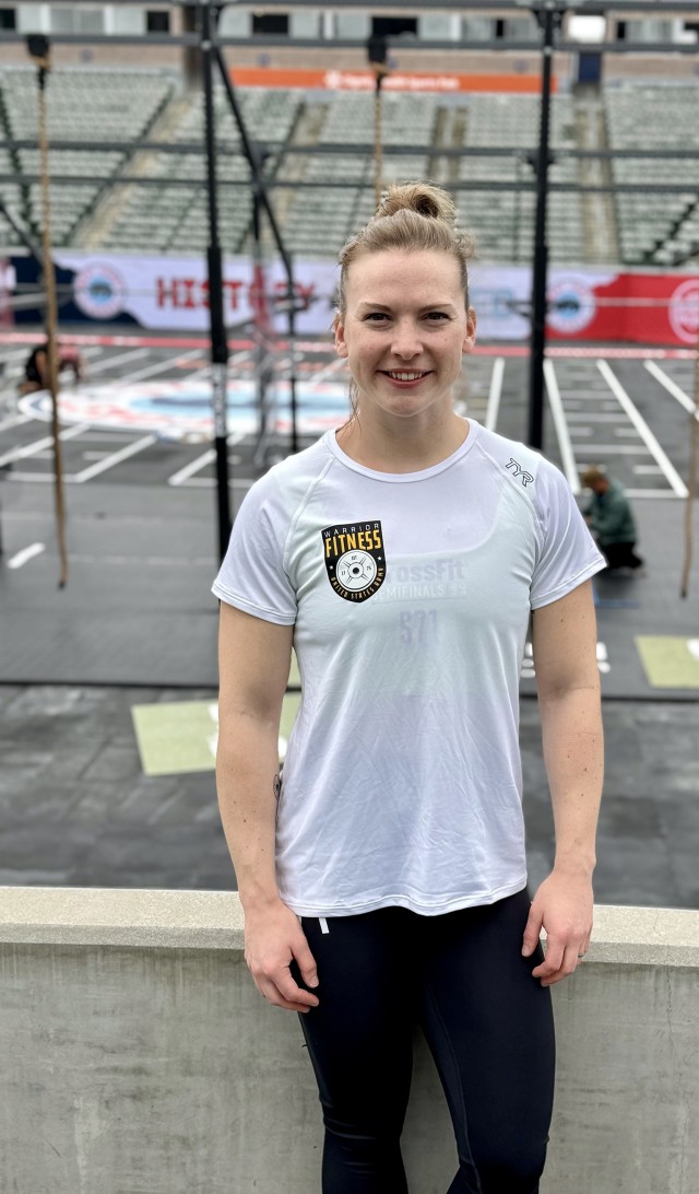 Army Capt. Katie Cunningham, a physical therapist assigned to the Warrior Fitness Team, U.S. Army Recruiting Command, Fort Knox, Kentucky, stops for a photo during the West Coast Classic for the CrossFit Games in Carson, California.