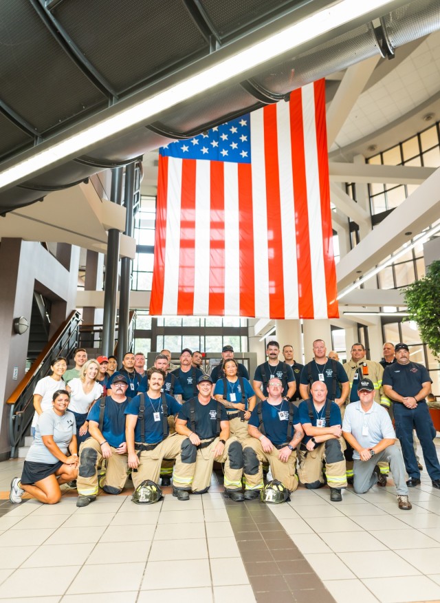Fort Novosel firefighters, soldiers and community members participate in the 9/11 Memorial Stair Climb inside Bldg. 5700 on Fort Novosel Sept. 6, 2024.