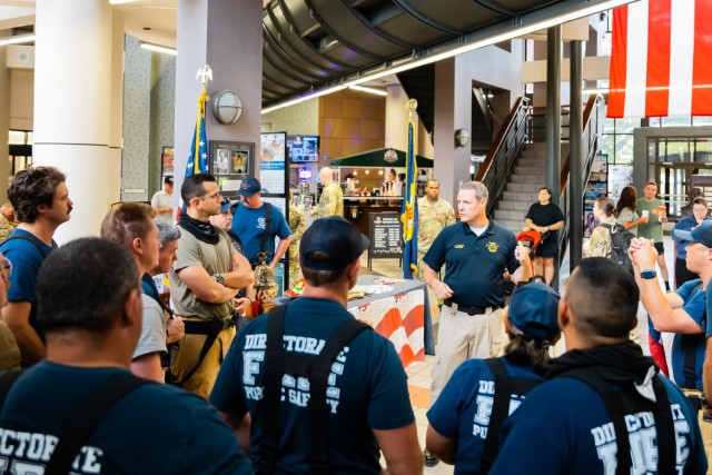 Jeremy Evett, Fort Novosel Fire Chief, speaks to Fort Novosel firefighters before the 9/11 Memorial Stair Climb inside Bldg. 5700 on Fort Novosel Sept. 6, 2024.