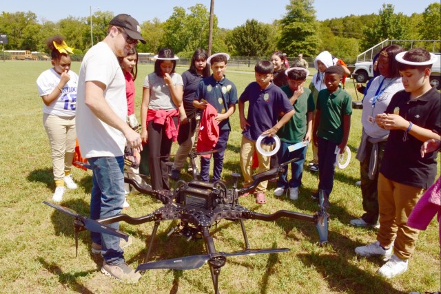 Employees highlight careers at Antioch Middle School STEAM event