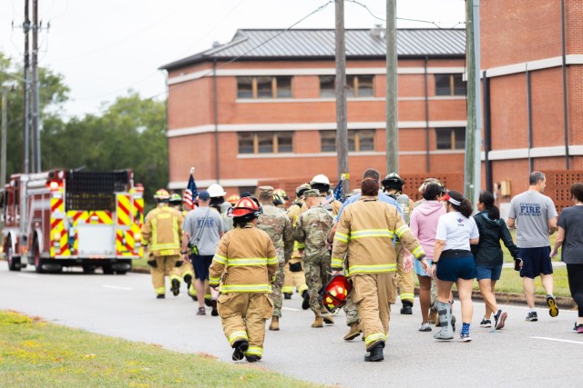 The Fort Novosel Directorate of Public Safety conducts a 9/11 Movin Tribute Wednesday, Sept 11. After a brief ceremony, participants walk 2.33 miles to honor Stephen Siller, an off-duty New York City firefighter, who gave his life while serving...