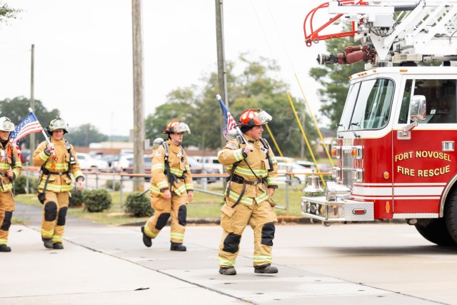 The Fort Novosel Directorate of Public Safety conducts a 9/11 Movin Tribute Wednesday, Sept 11. After a brief ceremony, participants walk 2.33 miles to honor Stephen Siller, an off-duty New York City firefighter, who gave his life while serving...