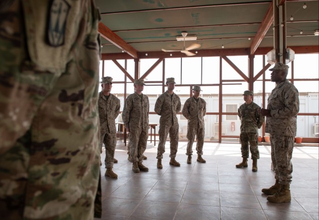 Gen. Langley presents coins at Camp Lemonnier