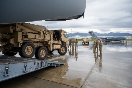 U.S. Army Soldiers assigned to Comanche Company, 1st Battalion, 501st Parachute Infantry Regiment, 2nd Infantry Brigade Combat Team (Airborne), 11th Airborne Division, load a Q-53 radar system onto a U.S. Air Force C-17 Globemaster III assigned to...