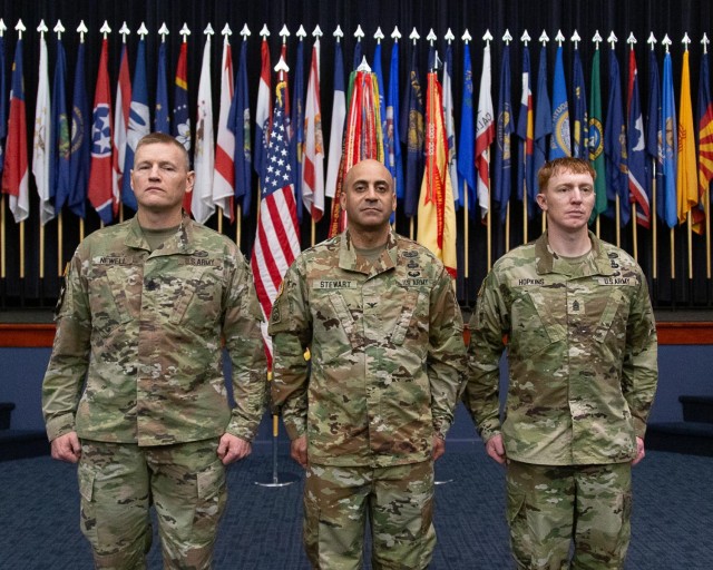 Col. David Stewart, commander, U.S. Army Garrison - Fort Belvoir, officiated a Change of Responsibility Ceremony between outgoing Command Sgt. Maj. Garth Newell and incoming Command Sgt. Maj. Daniel Hopkins Sept. 12 in Thurman Auditorium.