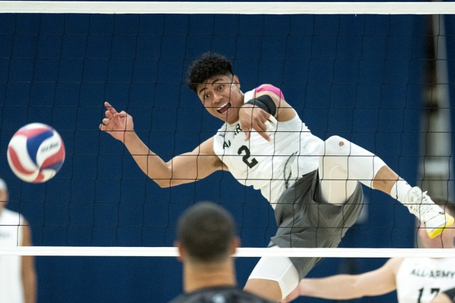 Spc. Asaleti Telea, a right side hitter on the All-Army men&#39;s volleyball team, unleashes a spike against the All-Air Force team, during Army&#39;s 3-1 victory on Sept. 12 at Fort Carson, Co. With the win, Army clinched the 2024 Armed Forces Volleyball Tournament championship after defeating Air Force 26-24, 21-25, 25-14 and 26-24. 