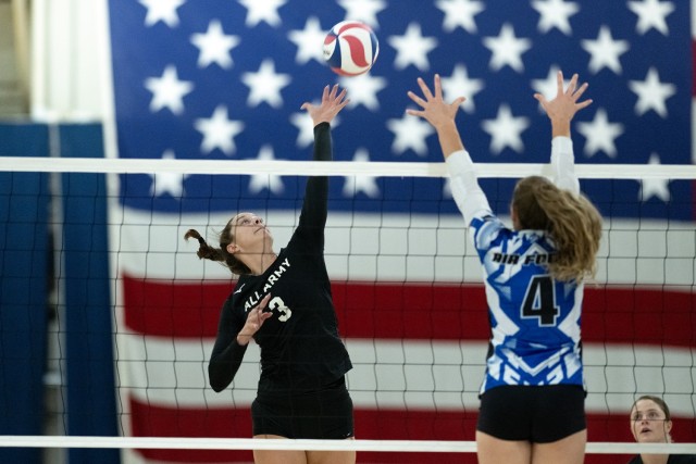 Capt. Sydney Morriss, a right-side hitter on the All-Army women&#39;s volleyball team, tips the ball over the net during Army&#39;s match with the All-Air Force team on Sept. 13. The All-Army women&#39;s team won its first Armed Forces tournament title since 2015 by defeating Air Force 3-1. 