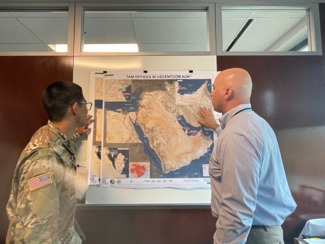 adet Sohn and Norberto 'Tito' Santana Reviewing Middle East Operations