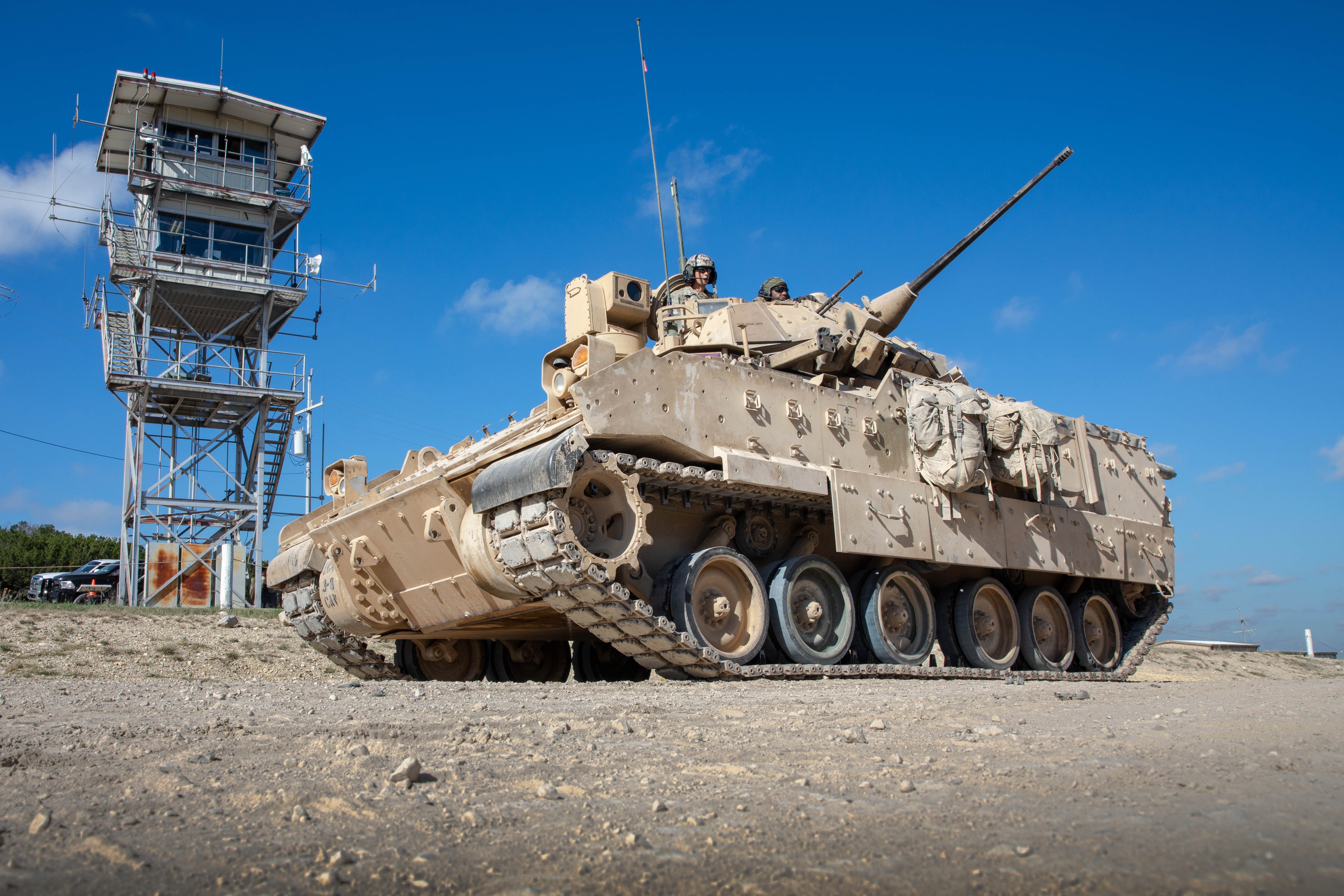 Army Maj. Wayland Griffin and Spc. Salim Hercules prepare for a crew qualification at Fort Cavazos, Texas, Sept. 19, 2024. Crew qualifications verify the lethality and effectiveness of a unit's crews and the ability to efficiently complete...