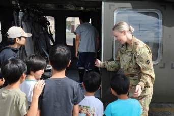 Local children’s home residents interact with Soldiers, tour helicopter