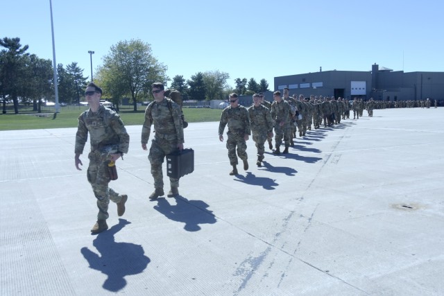 More than 300 Wisconsin Army National Guard Soldiers board charter flights Sept. 28, 2024, at Volk Field Air National Guard Base, Camp Douglas, Wis., following a formal sendoff ceremony. The Soldiers, part of the 1st Battalion, 128th Infantry Regiment, the 1st Battalion, 120th Field Artillery Regiment, the 132nd Brigade Support Battalion and the 457th Chemical Company, are deploying to U.S. Central Command in Southwest Asia and U.S. Africa Command, Horn of Africa.
 Wisconsin Department of Military Affairs photo by Vaughn R. Larson