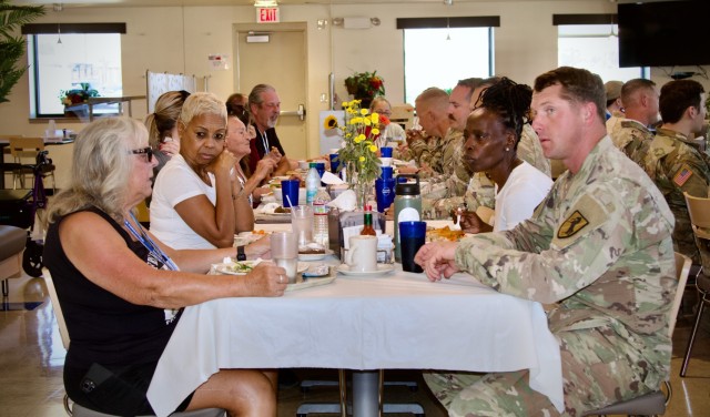 Gold Star Family Day: Fort Irwin welcomes regional Families for a day of remembrance 28 September, 2024. Family members enjoy lunch in the Coyote Cafe Dining Facility with current active duty Soldiers.