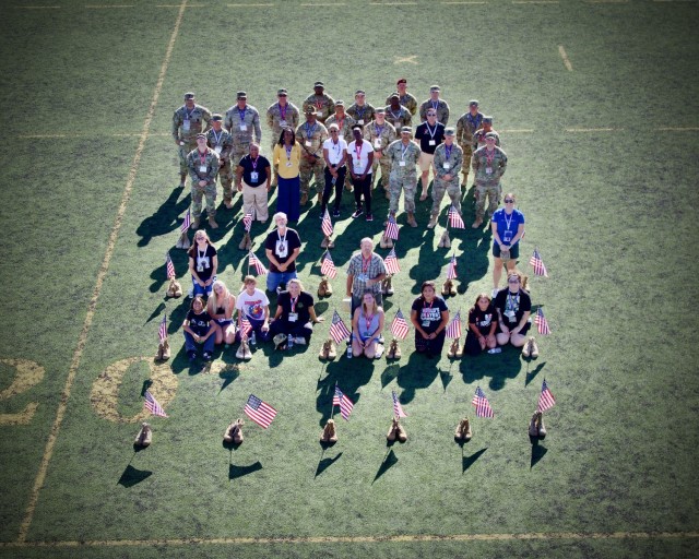Gold Star Family Day: Fort Irwin welcomes regional Families for a day of remembrance 28 September, 2024. Col. Lane A. Bomar and staff witness Gold Star Families join a memorial of U.S. flags and empty combat boots  in commemoration of Family...