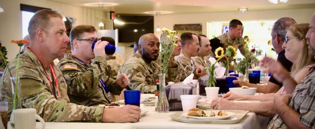 Gold Star Family Day: Fort Irwin welcomes regional Families for a day of remembrance 28 September, 2024. Family members enjoy lunch in the Coyote Cafe Dining Facility with current active duty Soldiers.