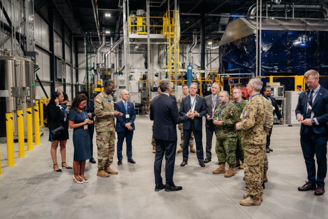 Officials from the JPEO Armaments and Ammunition came closer in their efforts to rebuild the Arsenal of Democracy with the inauguration of the new IMT Precision Production Facility in Ontario, Canada. This facility is capable of producing 15,000 155mm artillery metal parts per month and represents a key step in modernizing the defense industrial base.