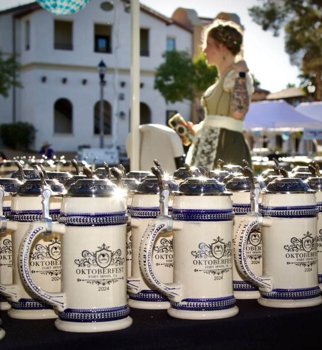 Fort Irwin Celebrates Oktoberfest 2024, a table of the official &#34;Steins&#34;  prior to the festival opening 28 September.