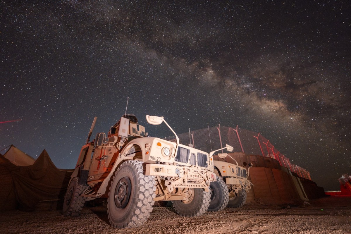 U.S. Army Soldiers assigned to Headquarters and Headquarters Battery, 169th Field Artillery Brigade, Task Force Thunder, park Mine-Resistant Ambush Protected vehicles in the U.S. Central Command area of operations, Aug. 1, 2024.