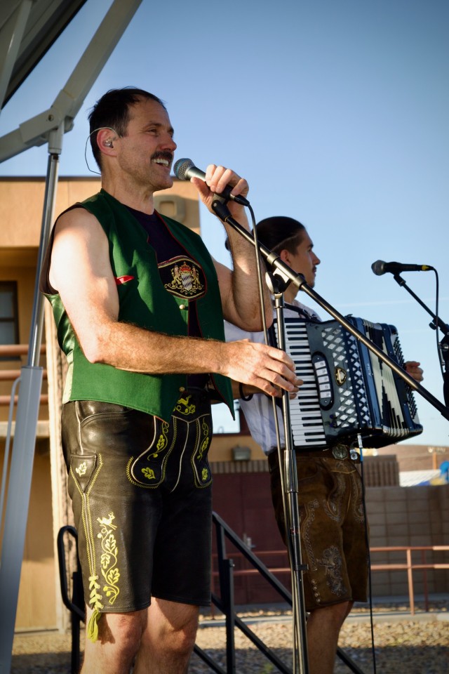 Fort Irwin Celebrates Oktoberfest 2024, The Hammerstein Band lead singer deliverers an energising performance 28 September.