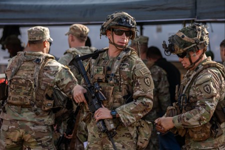 U.S. Army Soldiers assigned to the 2nd Light Brigade Combat Team (Provisional), 25th Infantry Division prepare for movement to Dillingham Airfield during the Joint Pacific Multinational Readiness Center (JPMRC) exercise at Scho...