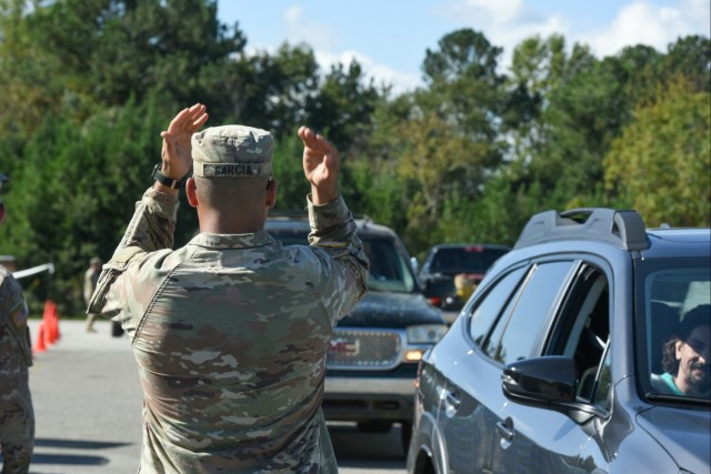 U.S. Army Staff Sgt. Kevin Garcia distributes water and supplies in Gaffney, South Carolina