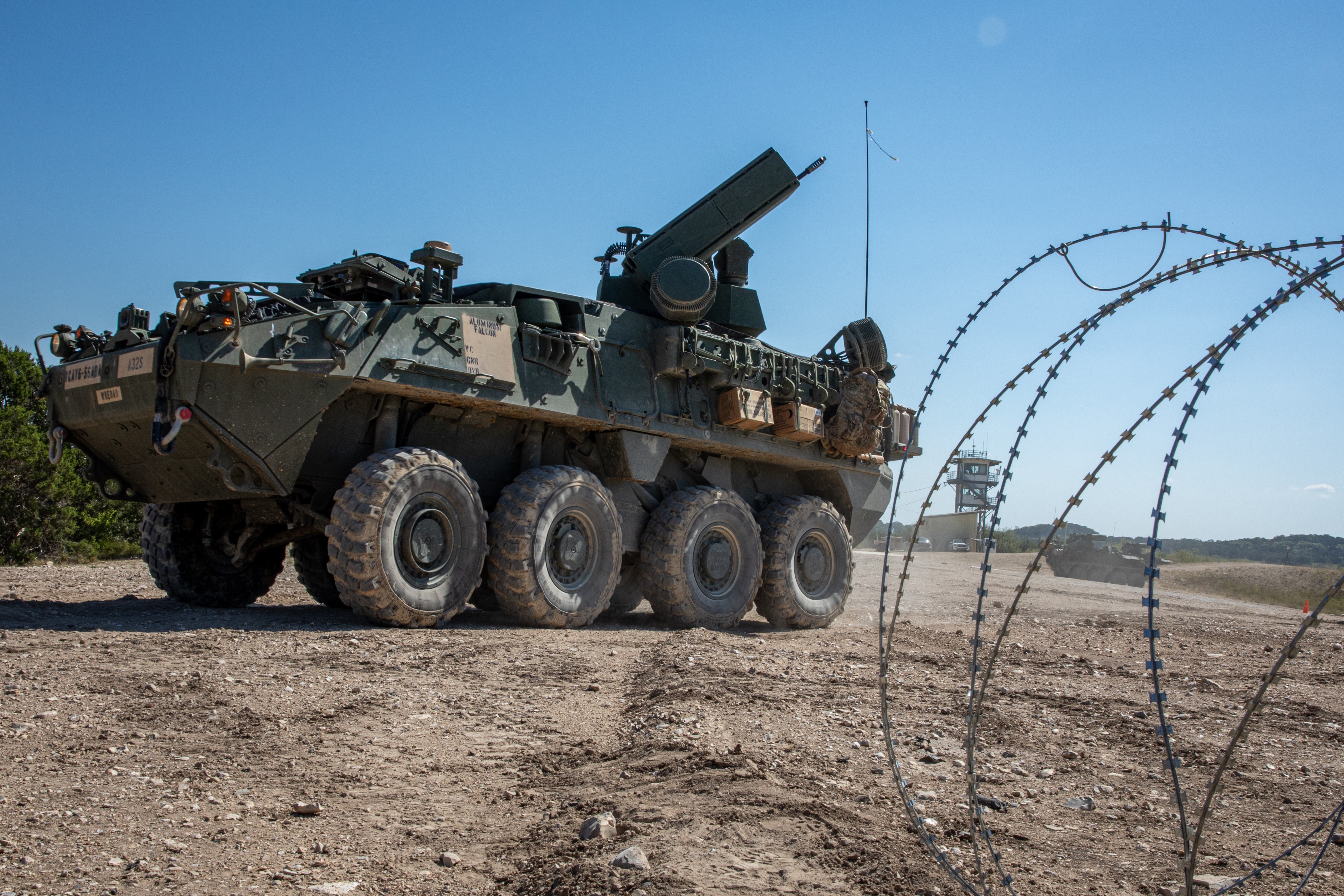 A U.S. Army M1265A1 Stryker Alpha Battery, 6th battalion, 56th Air Defense Artillery Regiment, at the ammunition point to receive ammunition before the Table IV iteration, as part of a crew qualification gunnery, at Dalton Mountain Multi-Use Range...