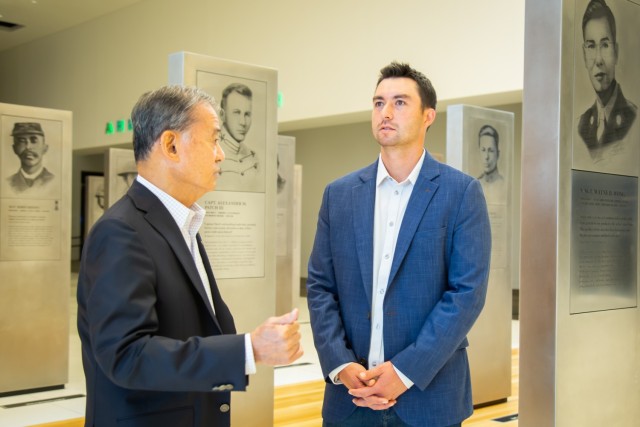 Retired Army Chief of Staff Eric Shinseki, left, presented San Diego Padres catcher Kyle Higashioka with a replica of the Congressional Gold Medal on July 22, 2024, which was awarded to Nisei Soldiers to honor their contributions during World War II. Higashioka is the grandson of Army veteran G. Shigeru Higashioka who served in the 442nd Regimental Combat Team and 100th Infantry Battalion during the conflict.