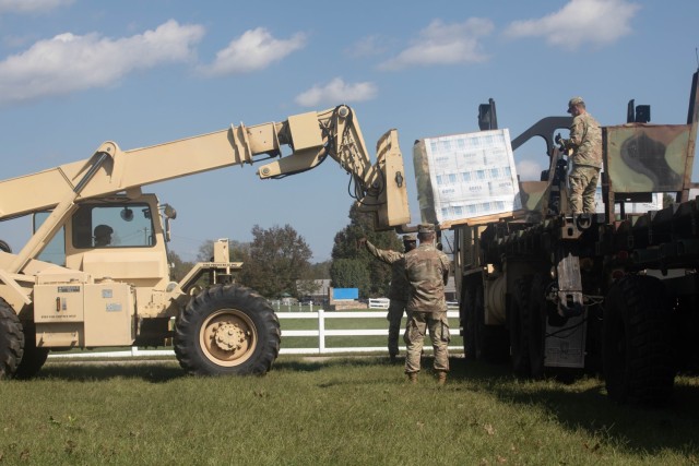 U.S. Army, 3rd Expeditionary Sustainment Command (ESC), 330th Movement Control Battalion (MCB), load food, water, and other resources in Marion, North Carolina, October 6, 2024. As part of our homeland defense mission, the Department of Defense,...