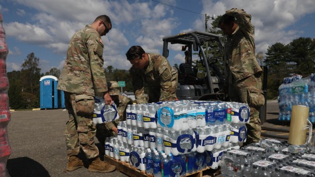 U.S. Army Soldiers of the 161st Engineer Support Company (Airborne) palletize water during relief operations at Spruce Pine, North Carolina on October 6, 2024. As part of our homeland defense mission, the Department of Defense, through U.S....
