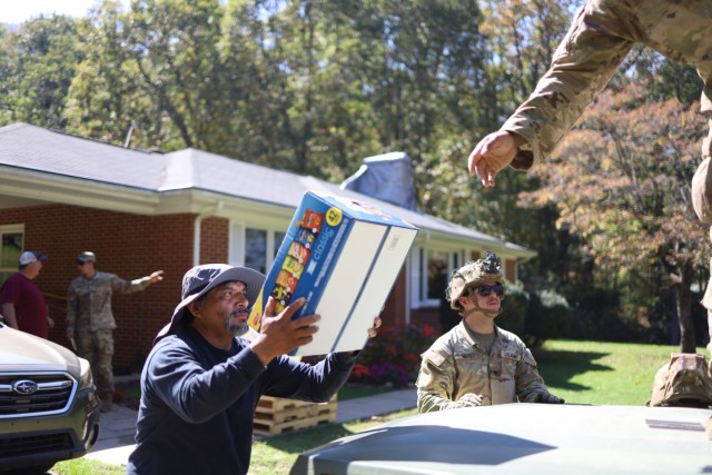 Soldiers assigned to 2nd Battalion, 502nd Regiment, 101st Airborne Division, deliver relief supplies to affected citizens in Garren Creek, N.C. on Oct. 7, 2024. 2nd Battalion arrived as additional support on Oct. 5, 2024, bringing engineer assets...