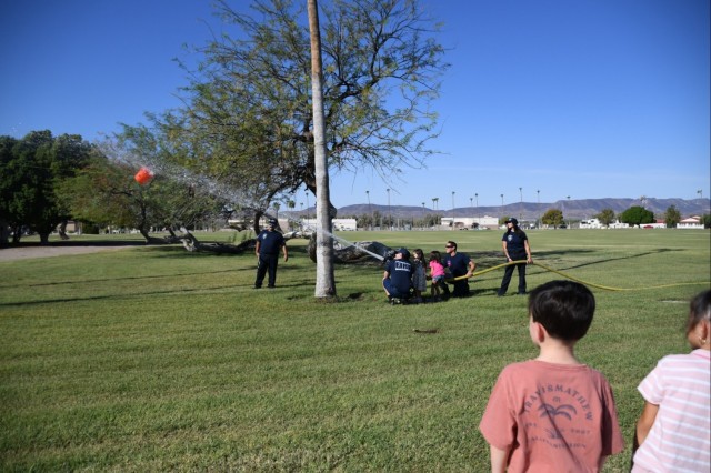 During this year’s Fire Prevention Week, the U.S. Army Yuma Proving Ground Fire Department (YPG FD) made sure the YPG community, regardless of age, learned about fire safety. Here, Price Elementary School students hold and aim a fire hose at a...