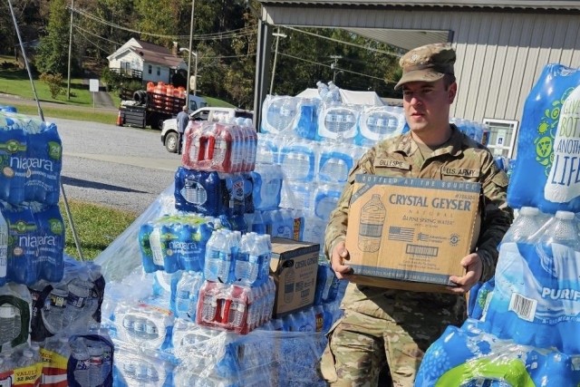 Virginia National Guard Soldiers assigned to the Cedar Bluff-based 1033rd Engineer Company, 276th Engineer Battalion, 329th Regional Support Group, assist with food and water distribution Oct. 5-6, 2024, in Damascus, Virginia. Approximately 20...