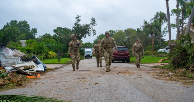 Soldiers from the Florida and South Carolina National Guard search for residents needing assistance near Stuart, Florida, Oct. 10, 2024.