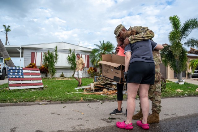 U.S. Soldiers assigned to Alpha Company, 1st Battalion, 124th Infantry Regiment, 53rd Infantry Brigade Combat Team, deliver water, meals and non-perishable goods to senior citizens in the Spanish Lake community in Port St. Lucie, Florida, Oct. 11, 2024. The state of Florida established point of distribution centers throughout Florida and deployed staging areas to ensure supplies were available to those in need. (U.S. Air National Guard photo by Tech Sgt. Chelsea Smith)