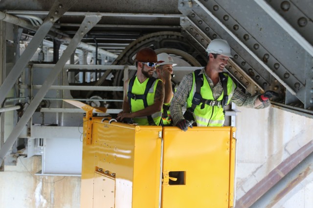 U.S. Army Corps of Engineers structural engineers assess a bridge for structural integrity during a routine bridge inspection