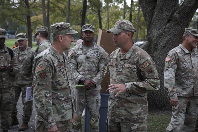 Air Force Gen. Steven Nordhaus, chief, National Guard Bureau, meets with Florida National Guard leaders and Guardsmen mobilized in Tampa, Florida, to help communities affected by Hurricane Milton Oct. 16, 2024. (U.S. Army National Guard photo by Sgt. 1st Class Zach Sheely)