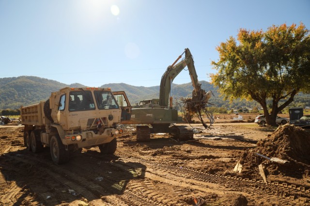 Tennessee Army National Guardsmen with the 194th Engineer Brigade clear debris at Charlie Carson Rd. in Washington County, Tennessee, on October 20, 2024. The 194th is made up of 19 units that are scattered across middle and west Tennessee. (U.S....