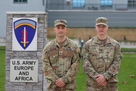 U.S. Army Reserve Sgt. Patrick Dellinger (left), a human resources specialist poses next to his brother, Spc. Felix Dellinger (right), a combat medic specialist, both assigned to the 97th Chemical Battalion, 163rd Regional Supp...