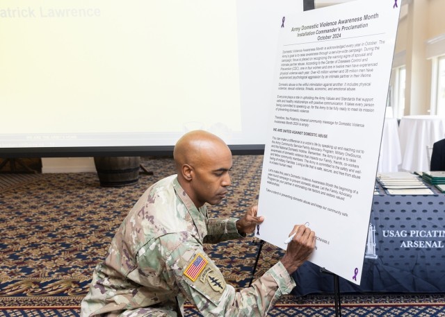 PICATINNY ARSENAL, N.J. - Picatinny Arsenal officials observed Domestic Violence Awareness Month with a proclamation signed by Picatinny Arsenal Garrison Commander Lt. Col. Craig A. Bonham II, during the garrison’s all-hands meeting on Oct. 15.