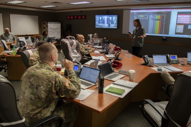 George Wible, emergency manager, briefs members of the Emergency Operations Center during the San Antonio Mass Casualty Exercise at Brooke Army Medical Center, Joint Base San Antonio – Fort Sam Houston, Texas, Oct. 23, 2024. In addition to...