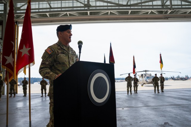 The commander of U.S. Army Pacific, Gen. Charles A. Flynn, speaks to the crowd gathered for a change of command ceremony on Oct. 25, 2024, at Joint Base Lewis-McChord, Washington. The passing of the guidon to the incoming commander represents...