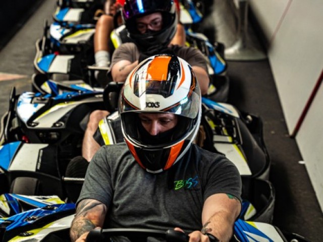 U.S. Soldiers assigned to 1st Battalion, 4th Infantry Regiment prepare to race in go-karts during a Better Opportunities for Single Soldiers event in Wackersdorf, Germany. (U.S. Army photo by Sgt. Christian Aquino)